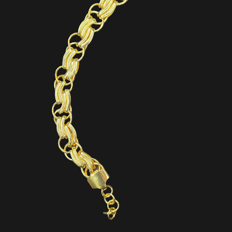 Gold chain on a black background